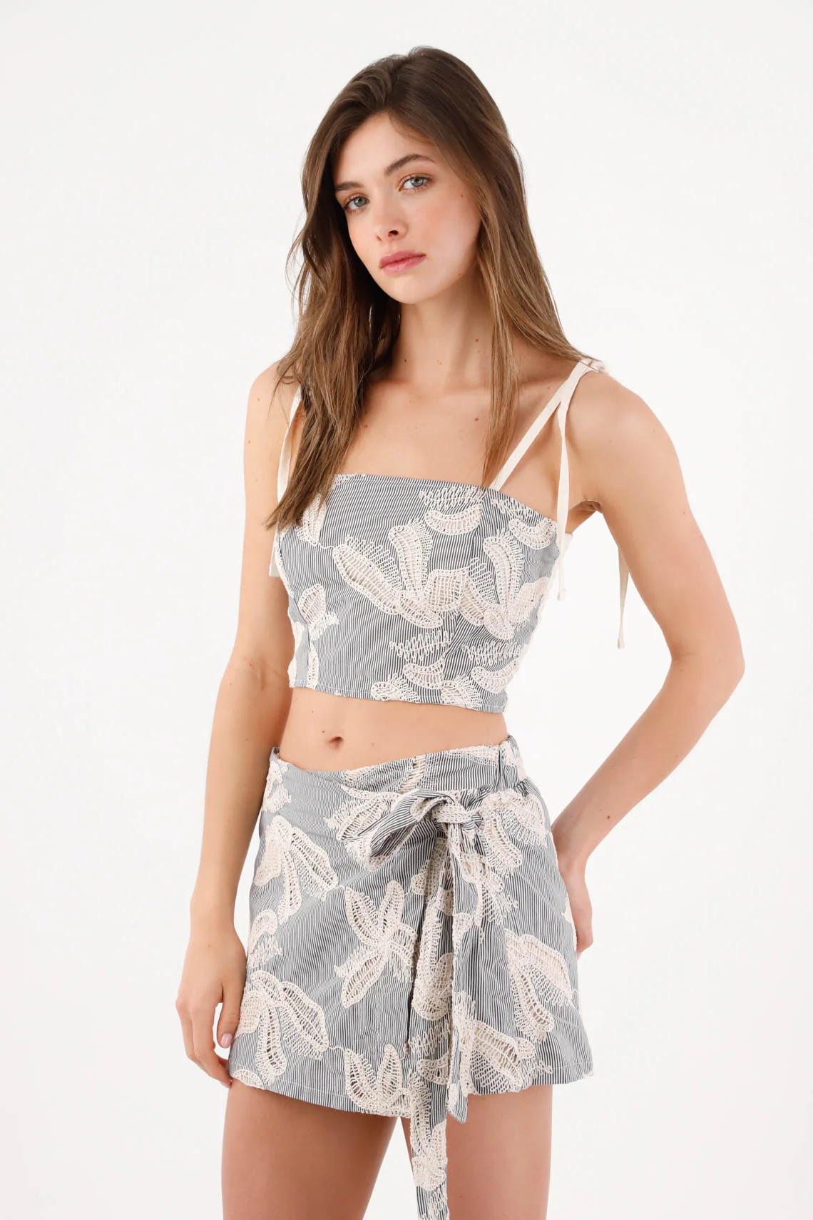 Mini skirt with front bow in gray cotton for women